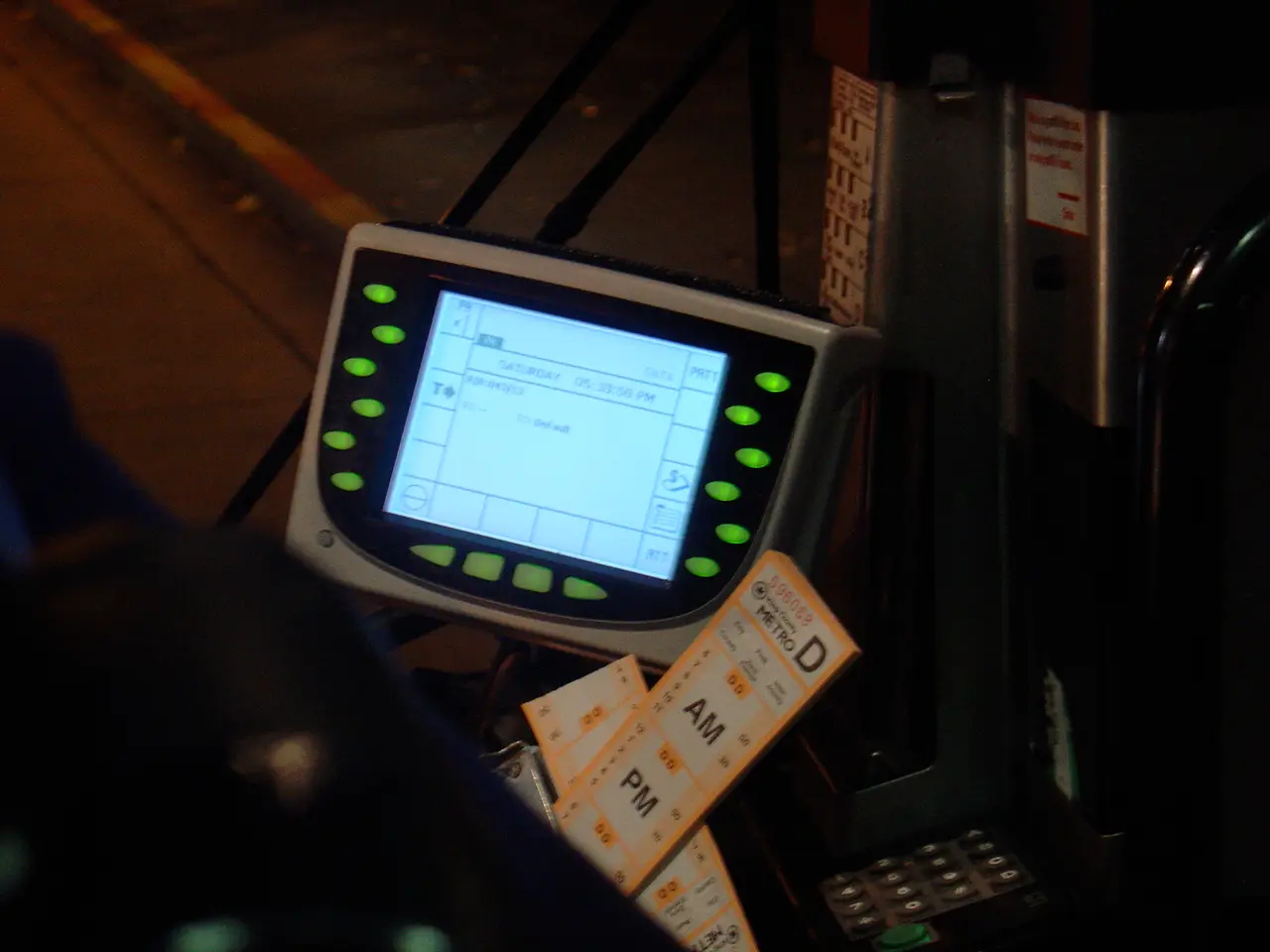Electronic logging device mounted in a commercial vehicle cab with paper trip tickets